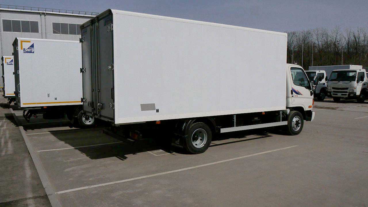 Хундаи HD 78 ЦТТМ Фургон грузовик сбоку и сзади